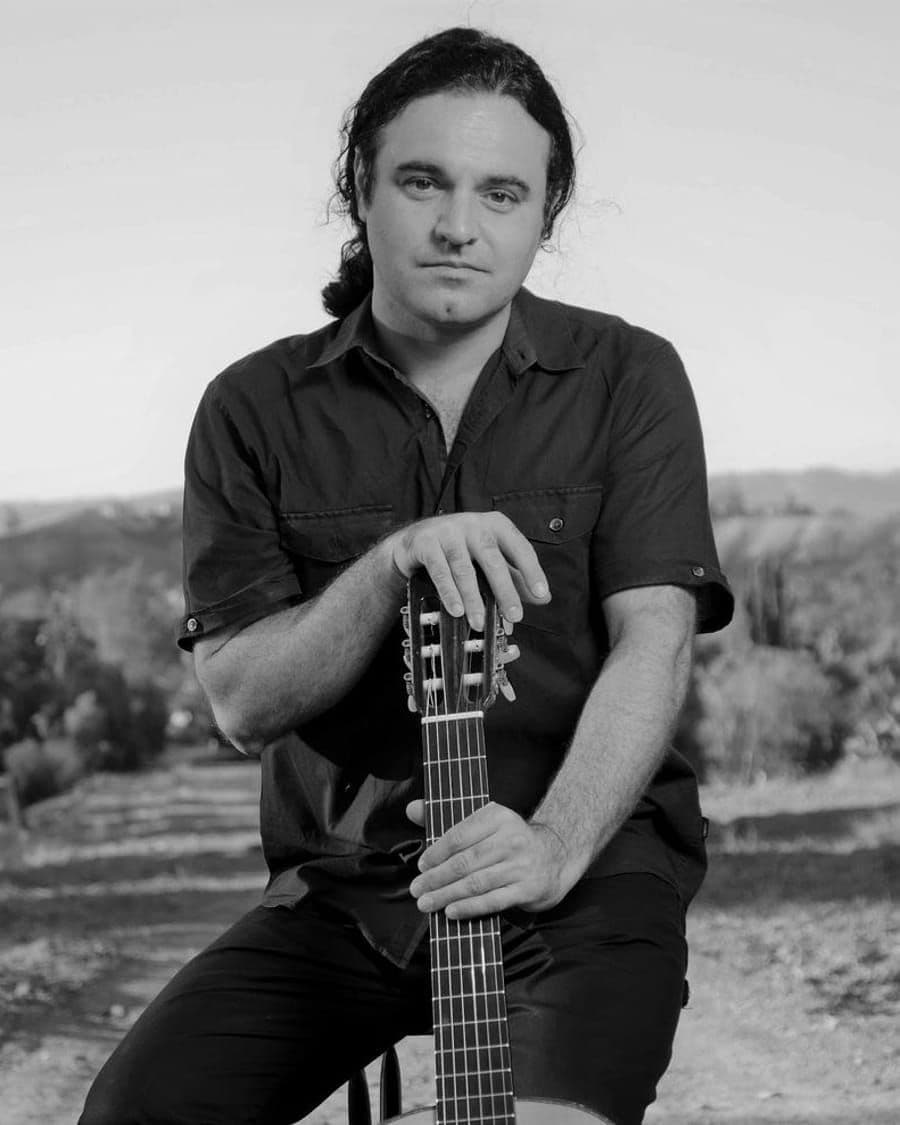 José Prieto — Spanish guitar and vocals, Calé